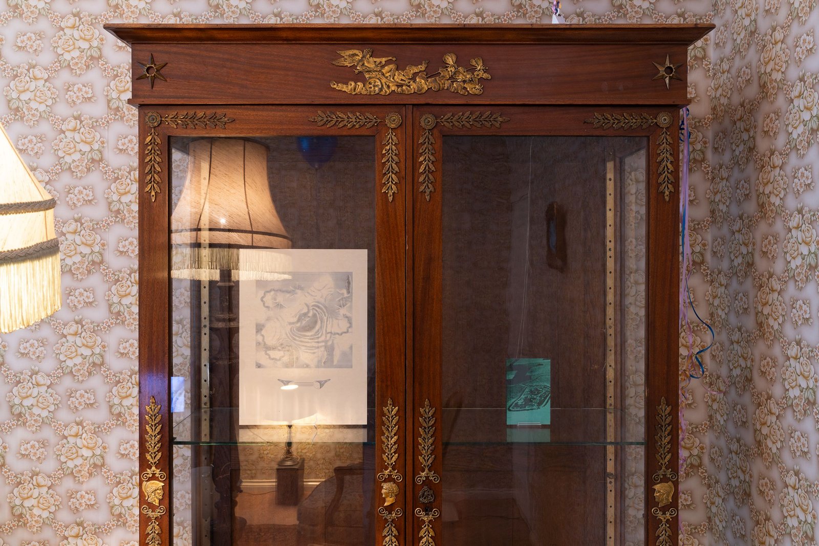 antique cupboard with 2 laser engravings inside